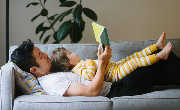 dad reading to his child